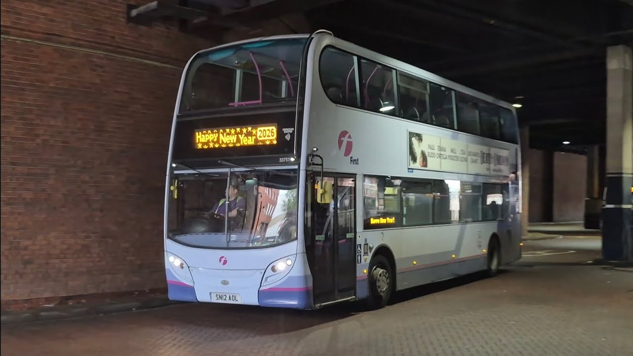 Happy New Year 2026 displayed on 33751 (SN12AOL) leaving Crowngate (17/09/2025)