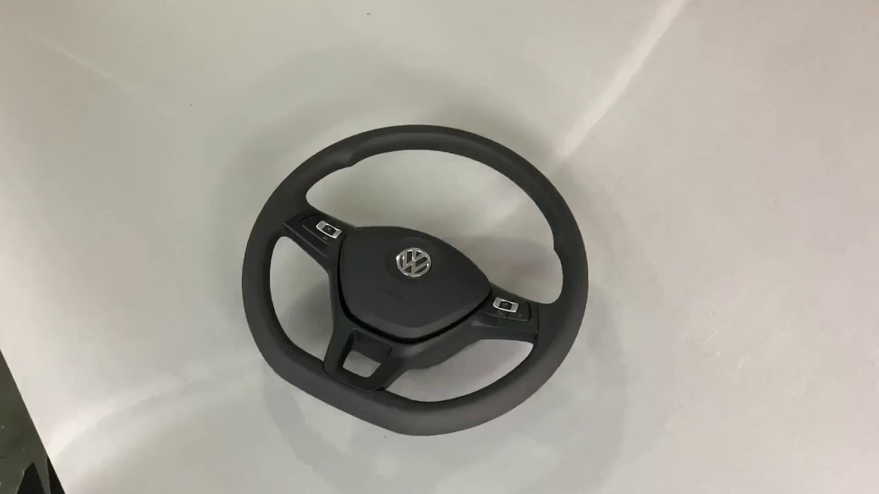 Como é feito o revestimento de um volante em couro