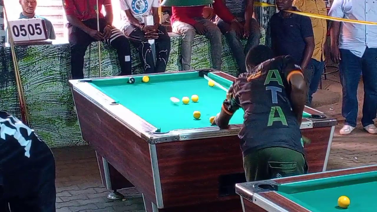 Mansoor vs Lucas. race to 6 at Paul gamers Mbarara. 32man's comp