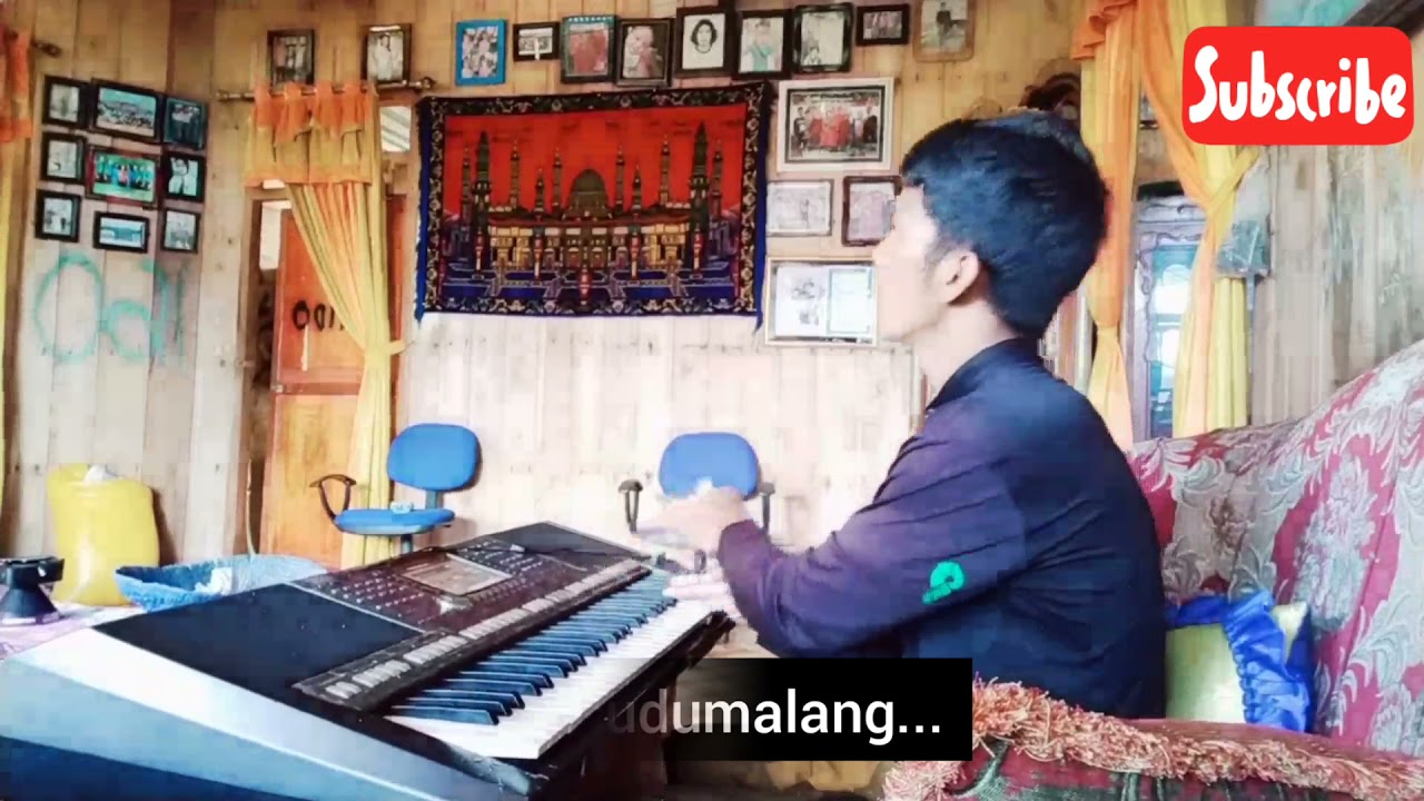 Karaoke lagu bajo jambatah kendari cover zulfan