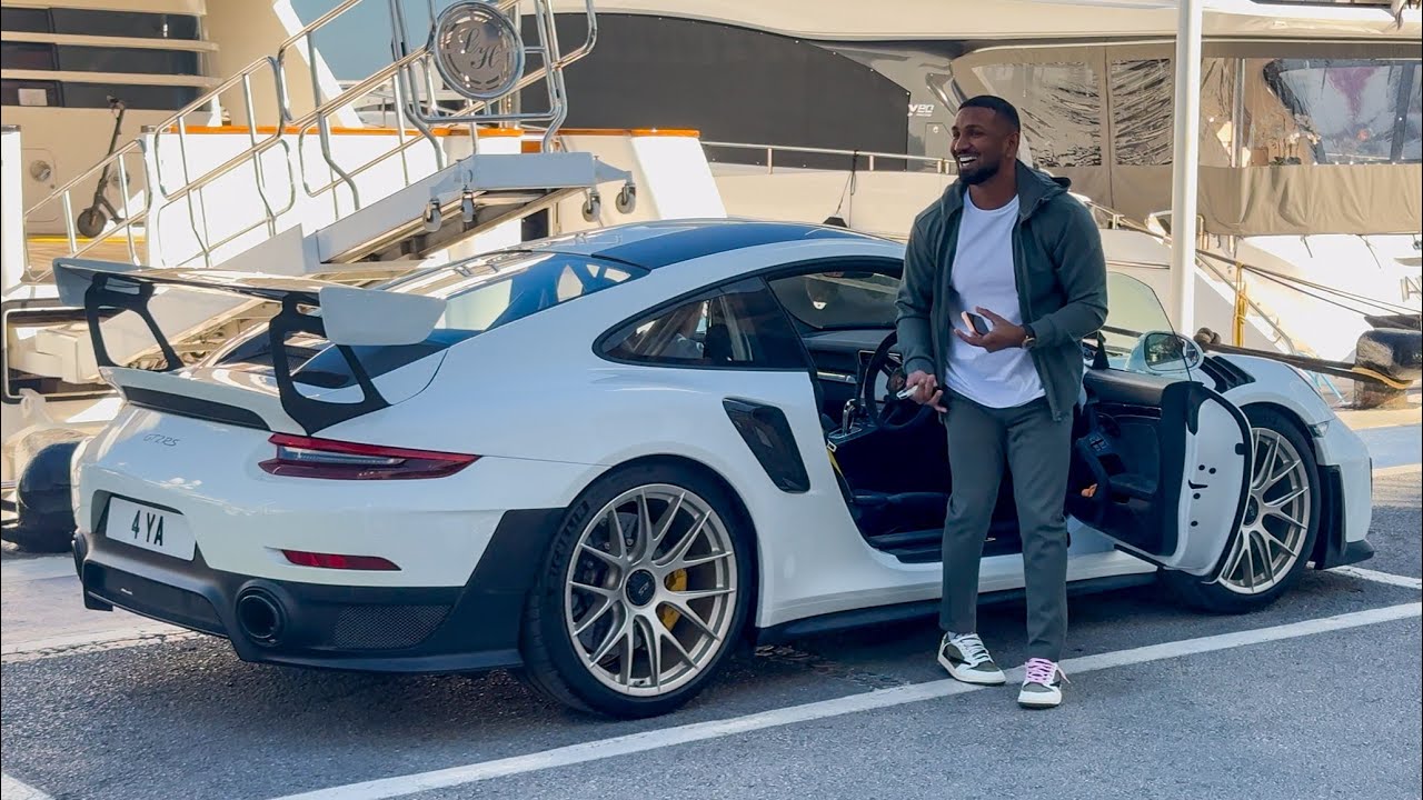 British Billionaire arriving in his PORSCHE GT2RS at Puerto Banus Marbella!!