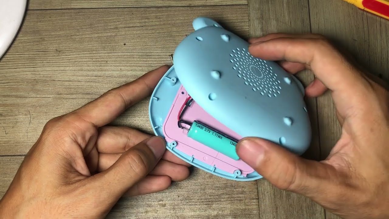 Tháo đồ chơi máy học song ngữ