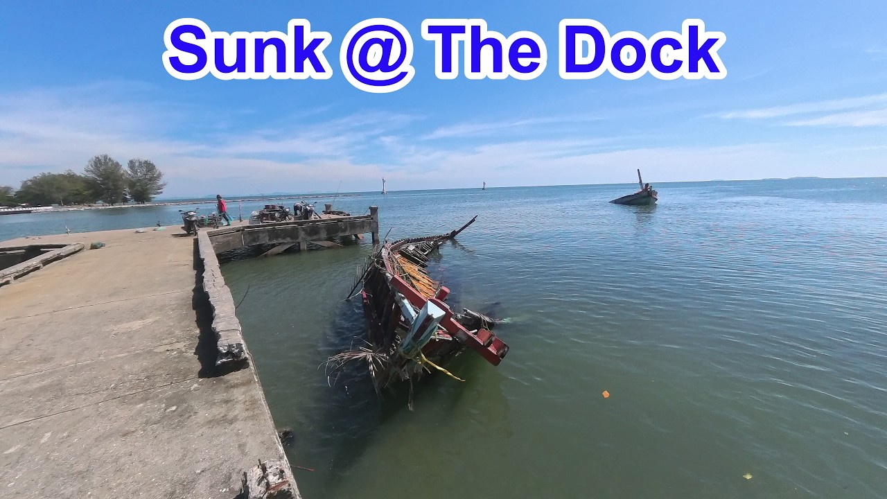 Old Fishing Boats Sunk at The Dock. Rayong Thailand.
