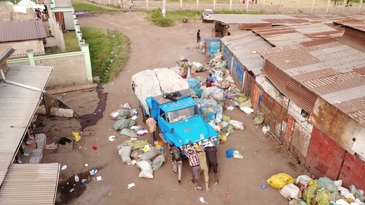 green venture recycles plastic waste into lumber and furniture
