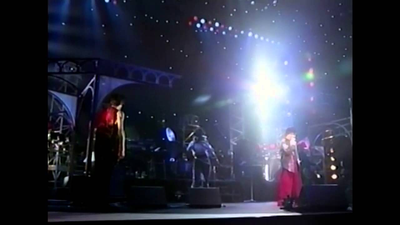山下久美子 - 魔法の消えた世界で (Live 1994)