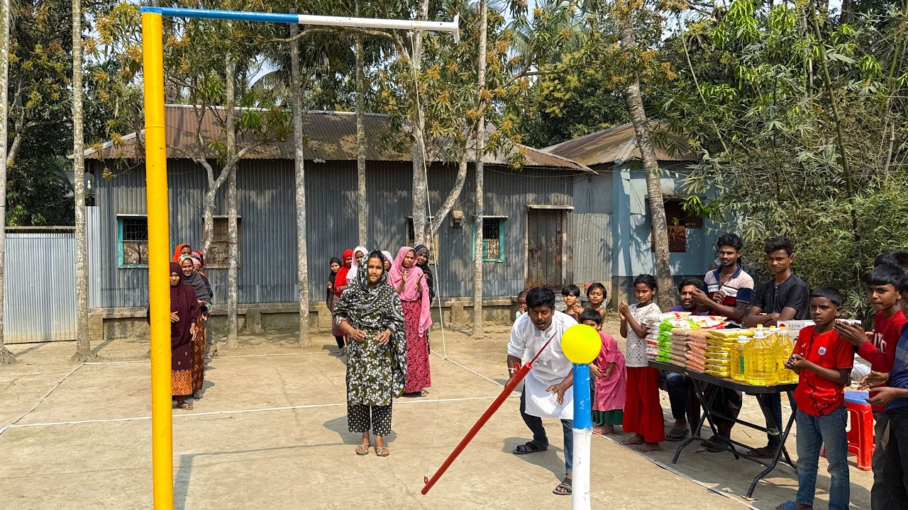 Perfect Aim or Miss?Village Girls Take on the Hanging Arrow Balloon Burst Challenge with Confidence!