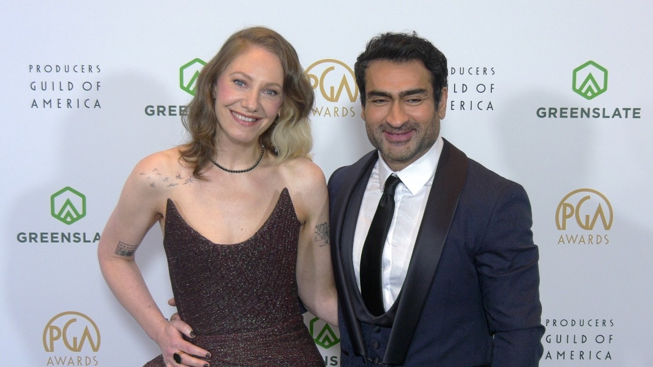 Emily V. Gordon and Kumail Ali Nanjiani on the black carpet at the 2026 PGA Awards