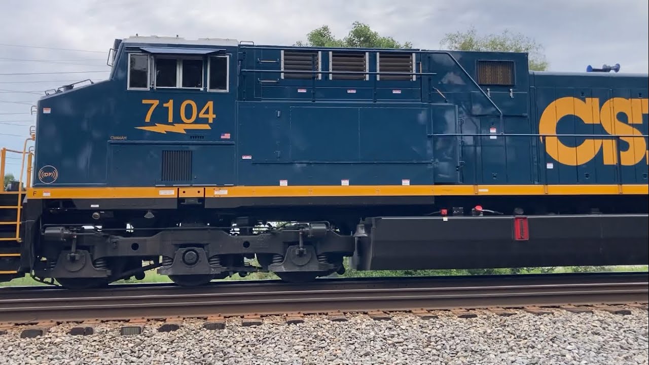 Two brand new CSX locomotives, 7104 leads the way with 7111 on the DPU!