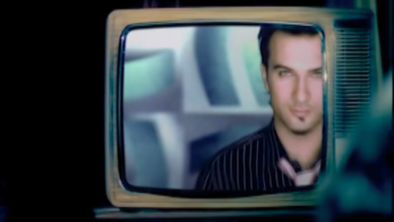 TARKAN - Gülümse Kaderine (Official Music Video)