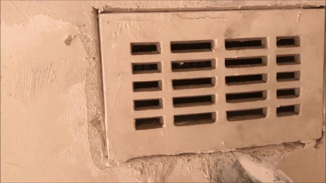 Installing  a vent onto a solid brick plaster wall