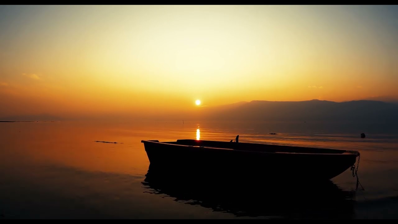 Peaceful Flowing Water Lapping Against Boat | The SonoVerse