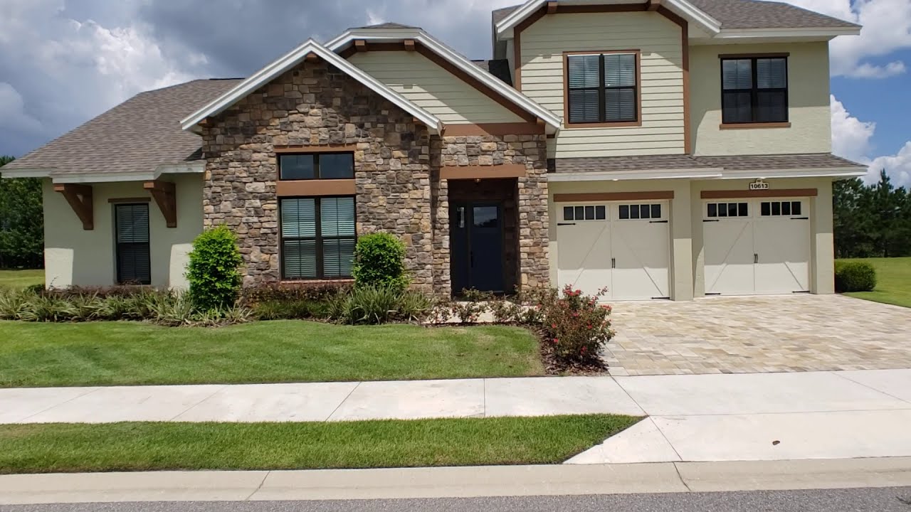 Open House Walk Through Tour of Willow 2 Model in Grand Oaks Manor Oxford, FL.