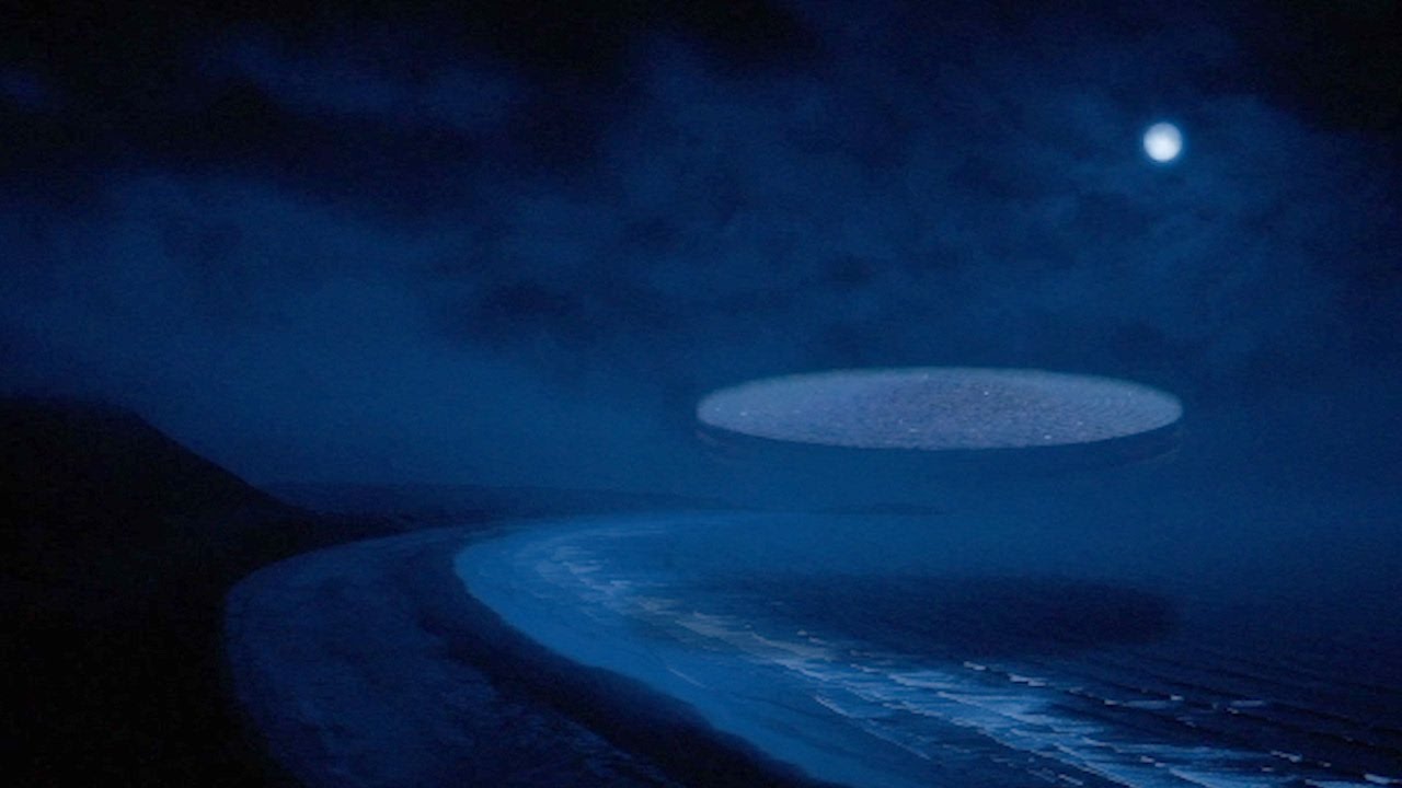 Disc-shaped UFO on Coast (CGI)