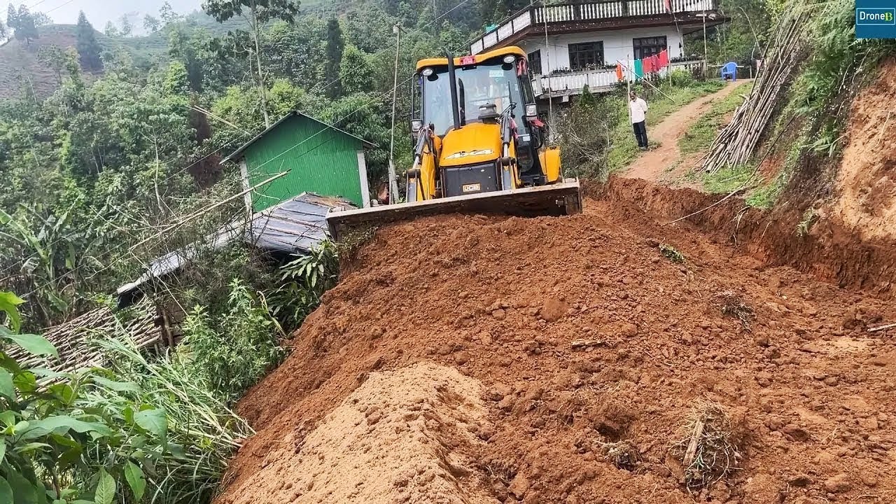 Clearing Congested Footpath Like Village Road with JCB Backhoe