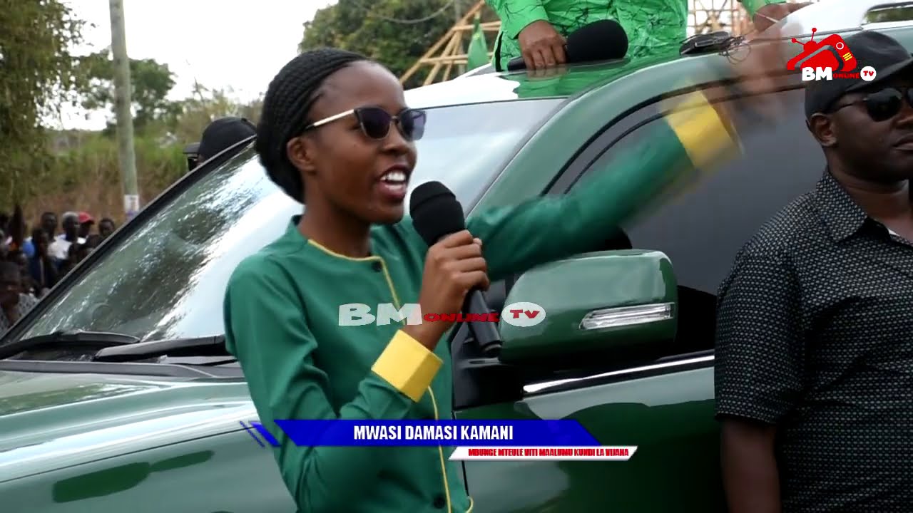 WAZIRI MKUU MH KASSIM MAJALIWA AMKUBALI MWASI DAMASI ALIVYO MUOMBEA KURA MH MAGUFULI