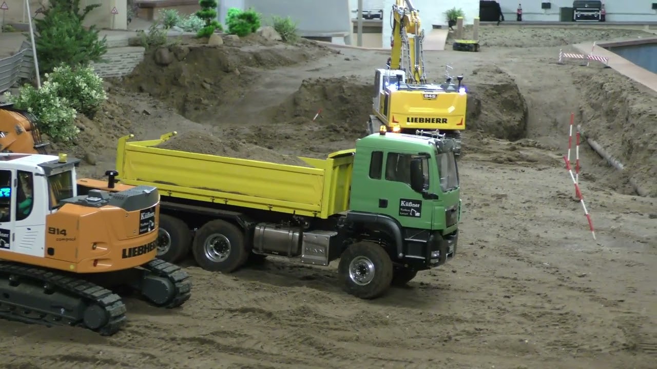 Liebherr 914 loads top soil