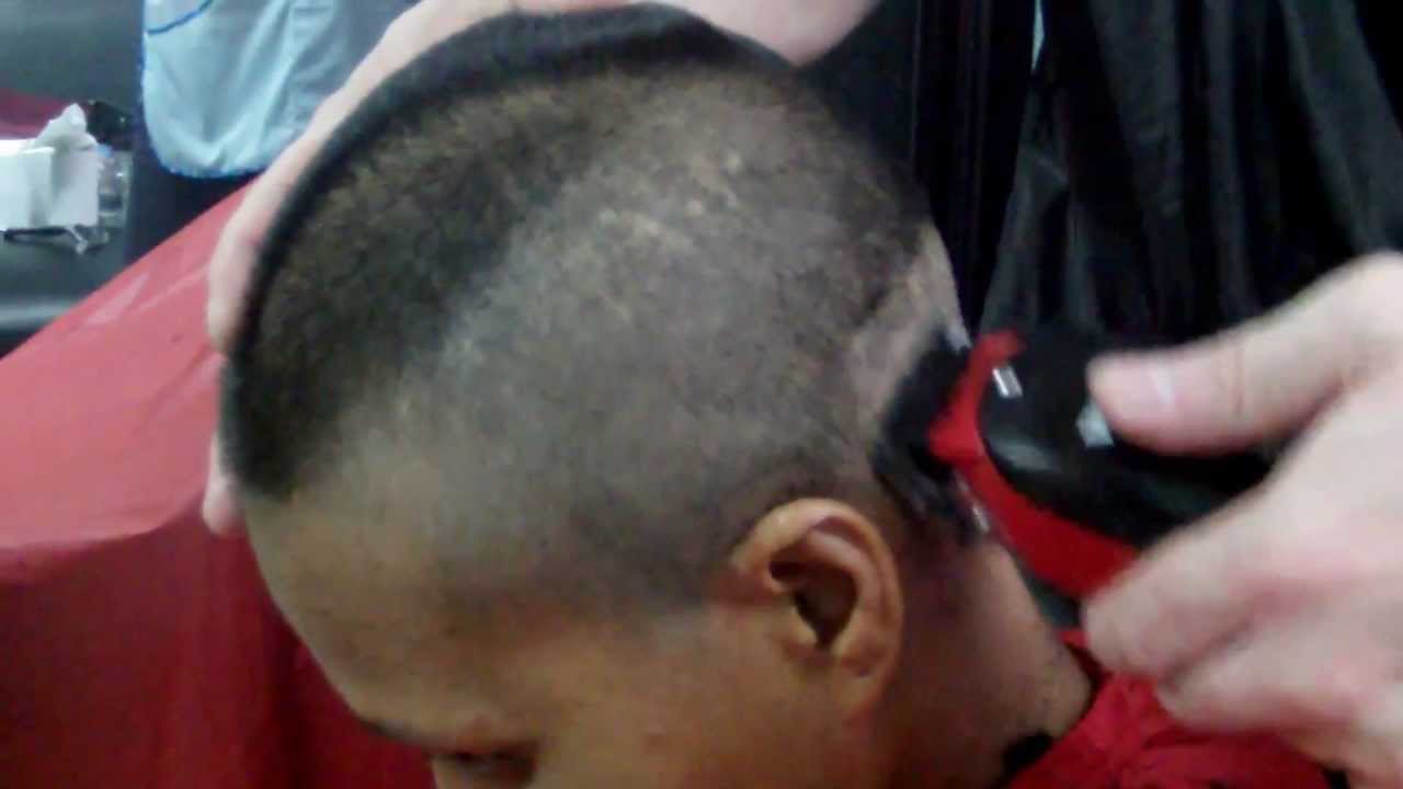 Military buzz cut woman