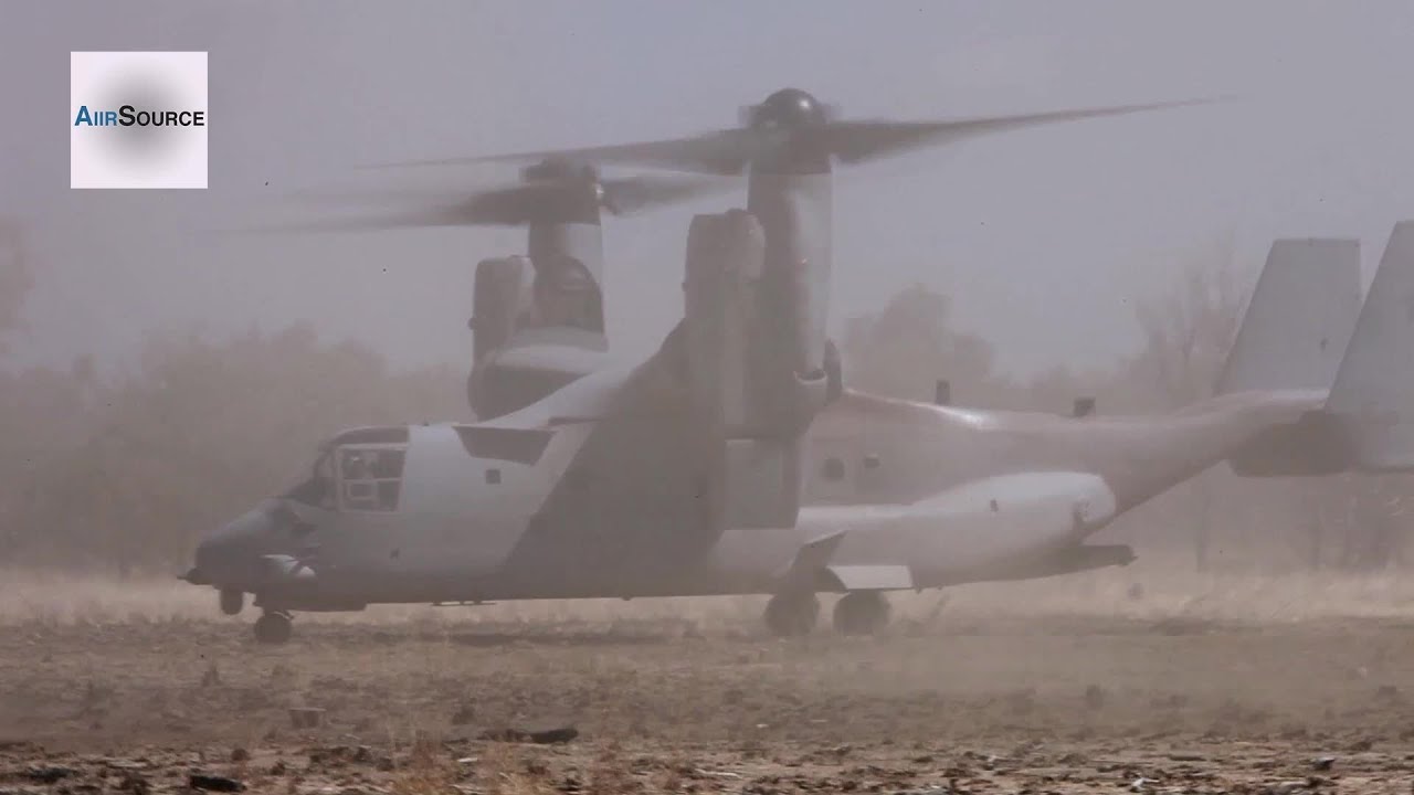MV-22 Osprey Landing in Dirt Field, Unloads Troops