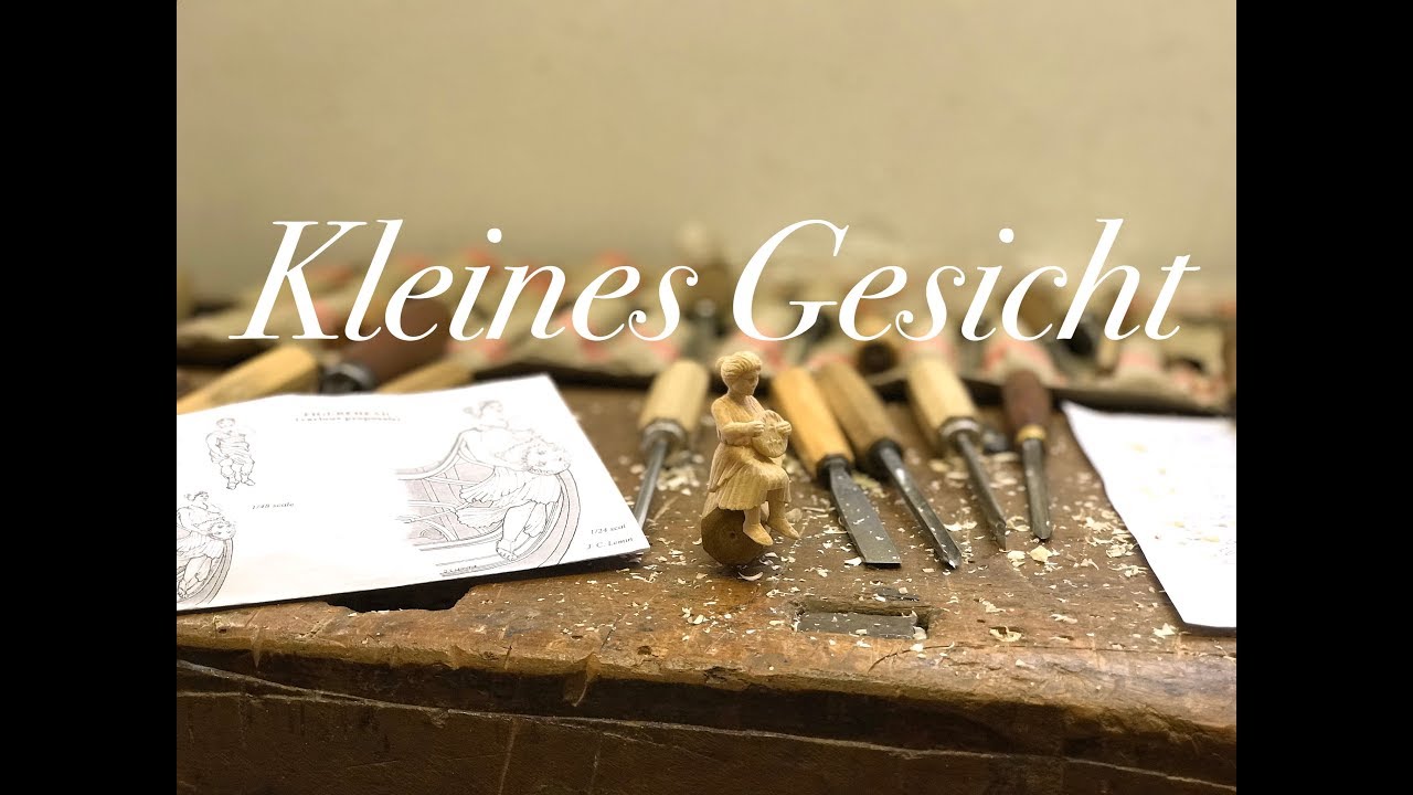Gesicht einer sehr kleinen Galionsfigur schnitzen