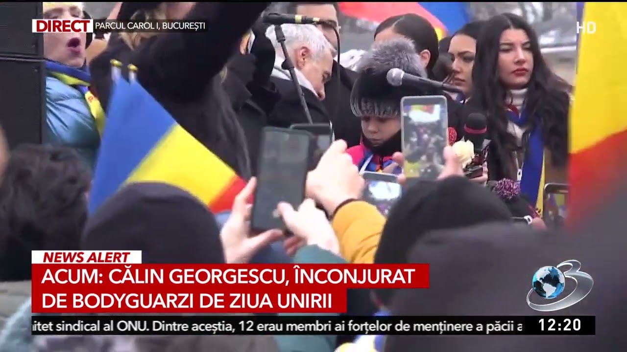 Călin Georgescu, înconjurat de bodyguarzi de Ziua Unirii