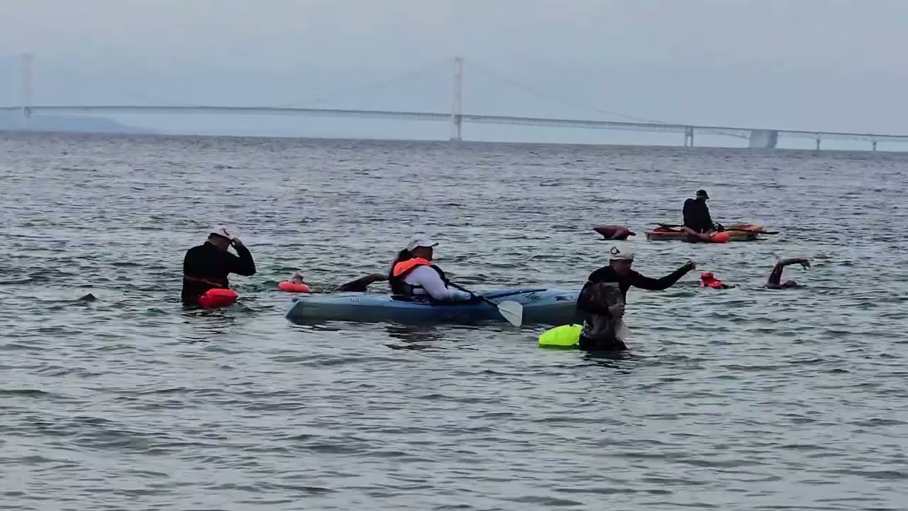 Scene of pure endurance swim around Mackinac Island with team: NL YMCA