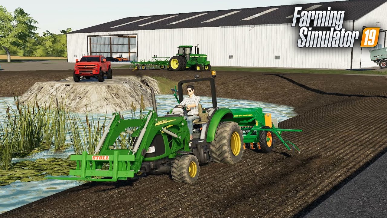 FS19- FIRST LANDSCAPING PROJECT! PLANTING GRASS AROUND THE POND AT THE TRUCK DEALERSHIP