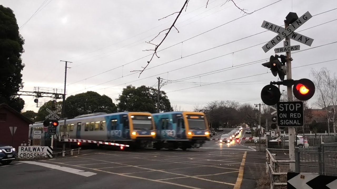 3 Trains At Once!!! Australian Railway crossing Parallel Run With 3 Trains Through At Once!