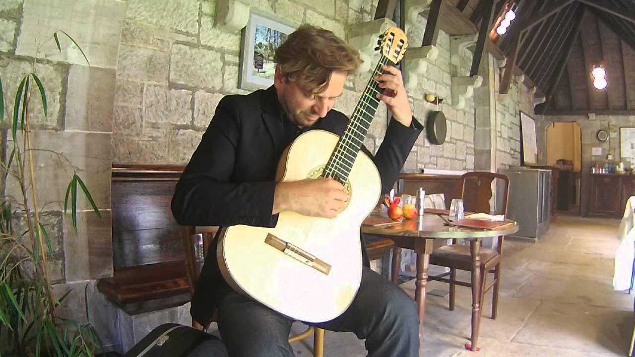 Marcin Dylla playing a spruce/maple guitar by James Lister