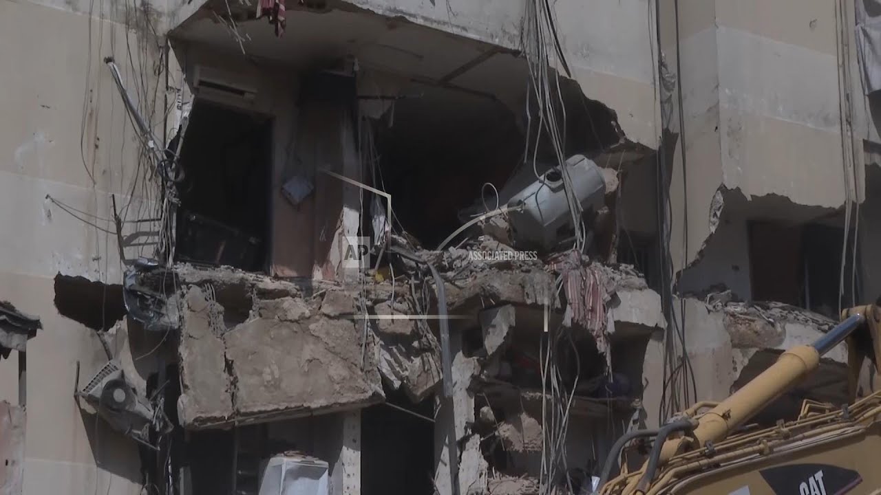 Beirut suburb wakes up to collapsed buildings after Israeli airstrike kills 31