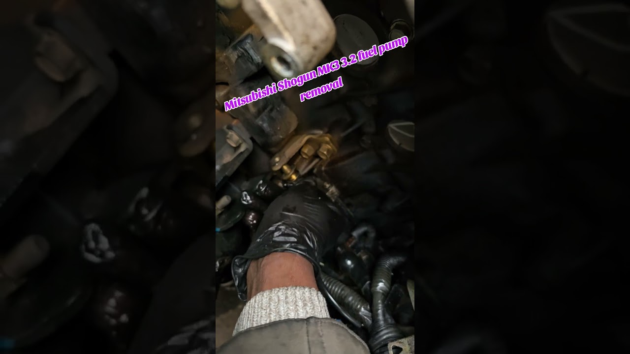fuel pump removal of mitsubishi pajero Shogun mk3 Montero 2006