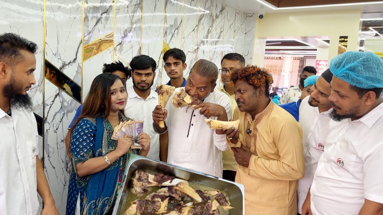 মশলা ছাড়া রান্না করা ১২কেজির বিশাল নলি খেয়ে বসুন্ধরা আবেশ হোটেলে বিশ্ব রেকর্ড গড়লেন জহির খাদক