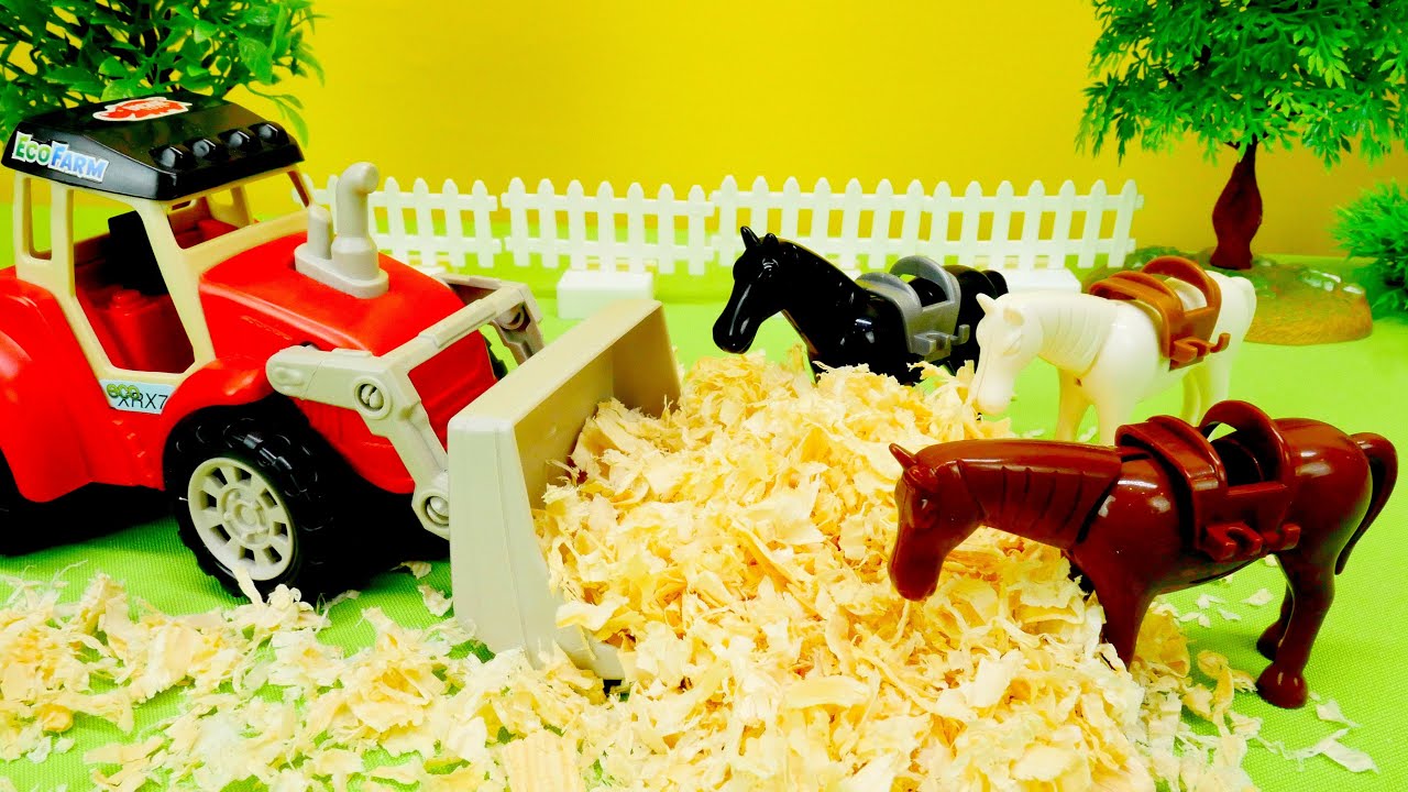 Vidéo éducative en français pour enfants. Les tracteurs font le pâturage pour les chevaux.