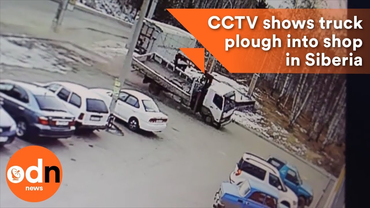 Shocking CCTV shows truck plough into shop in Siberia