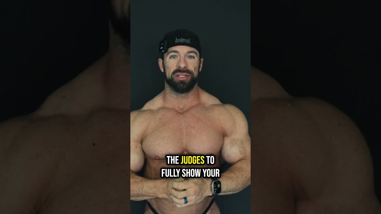 Rear Double Bicep fixing small arms In the rear double you need to really drive the hands back hard