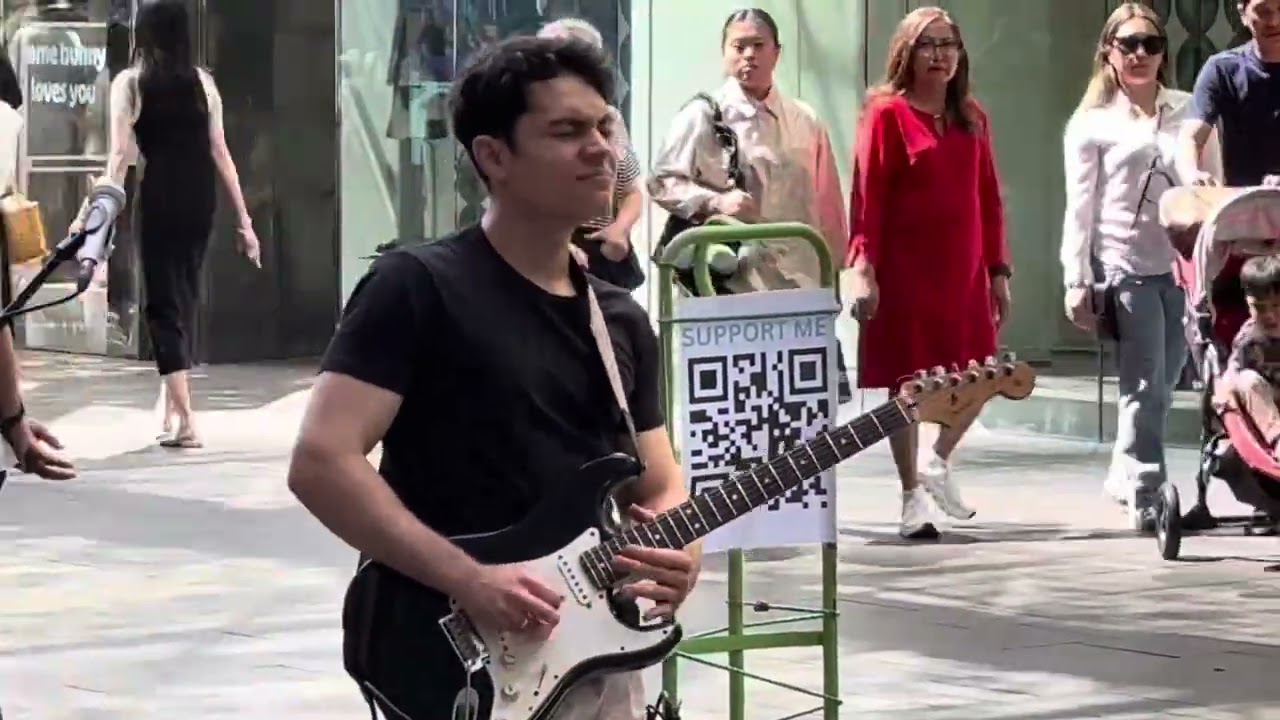 Andryel guitar playing Billie Jean on a fine Sydney day