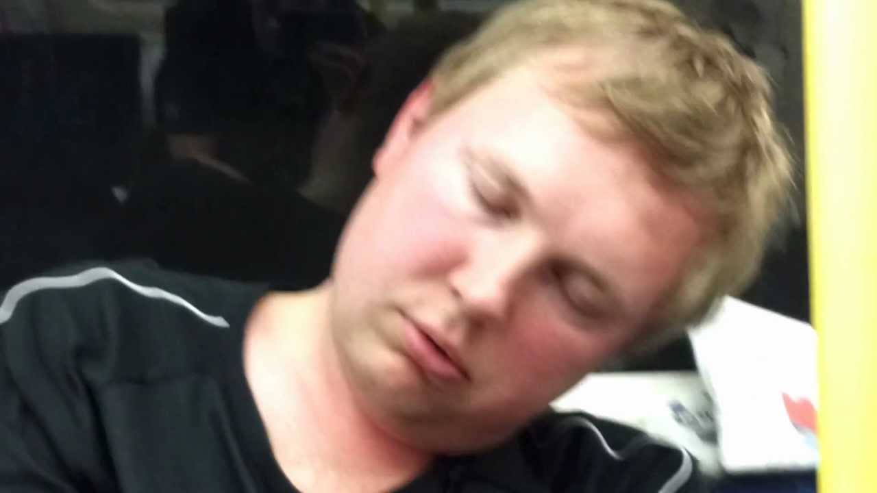 Sleeping man on train
