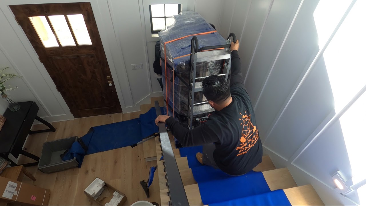 Moving a heavy piano upstairs with tight landings by Rescue Movers in Dallas TX | Dalla Movers