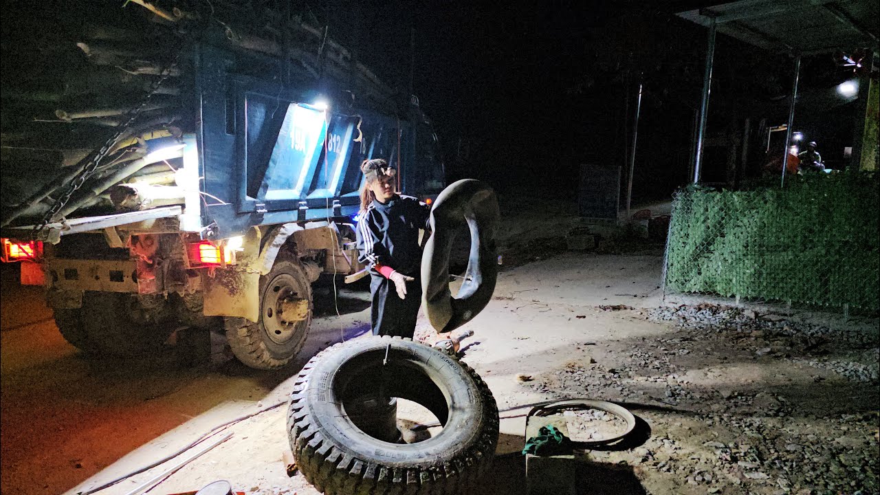 The female mechanic saved a severely damaged truck tire late at night