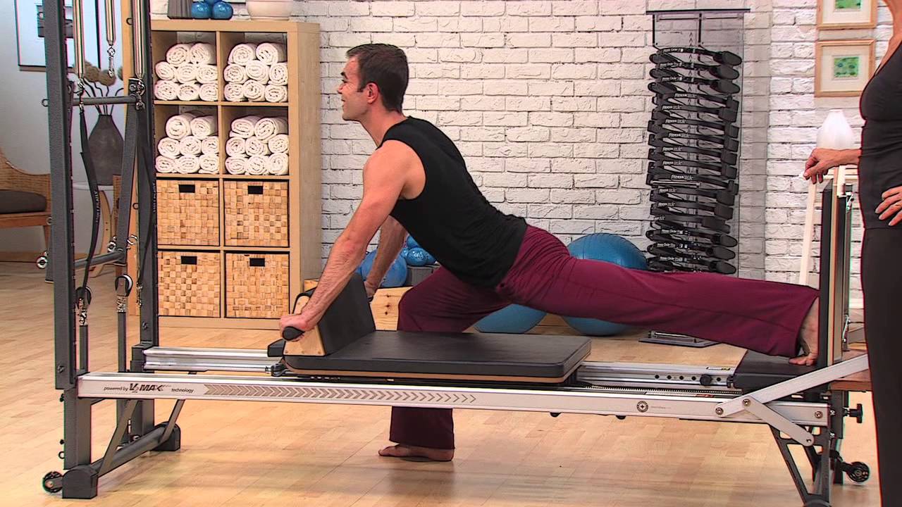 Kim Kraushar demonstrates the Vinyasa Yoga routine on the V2max Plus Reformer