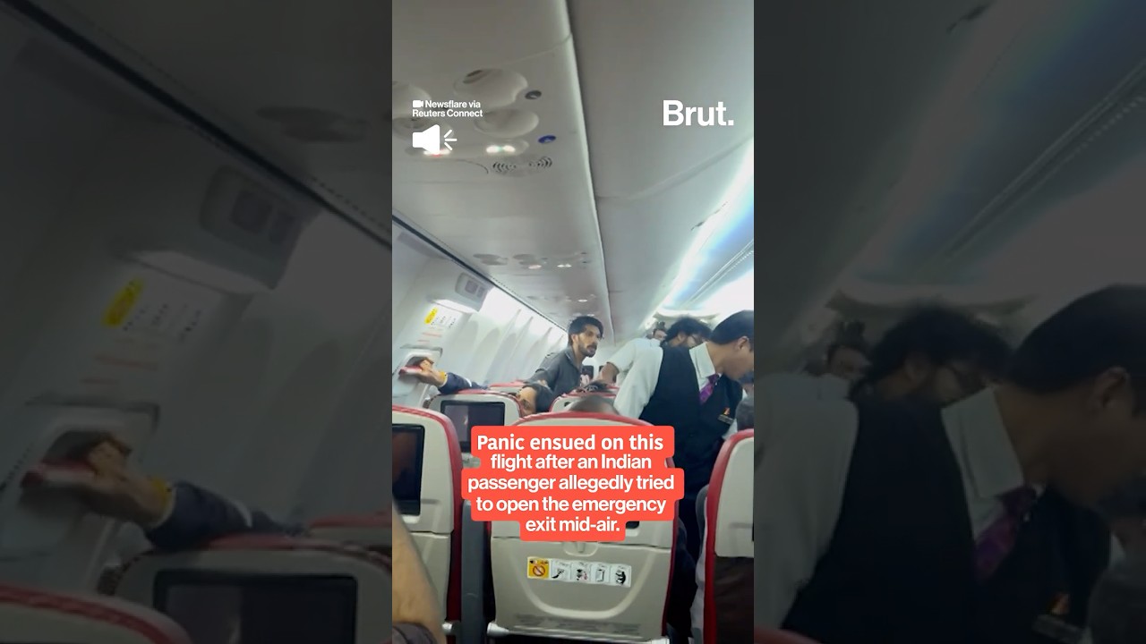 Passenger arrested after allegedly trying to open plane's emergency exit