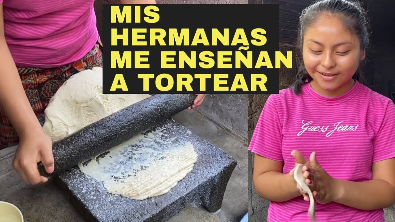 Estefanni usa la piedra de moler por primera vez/ enseñándole a tortear