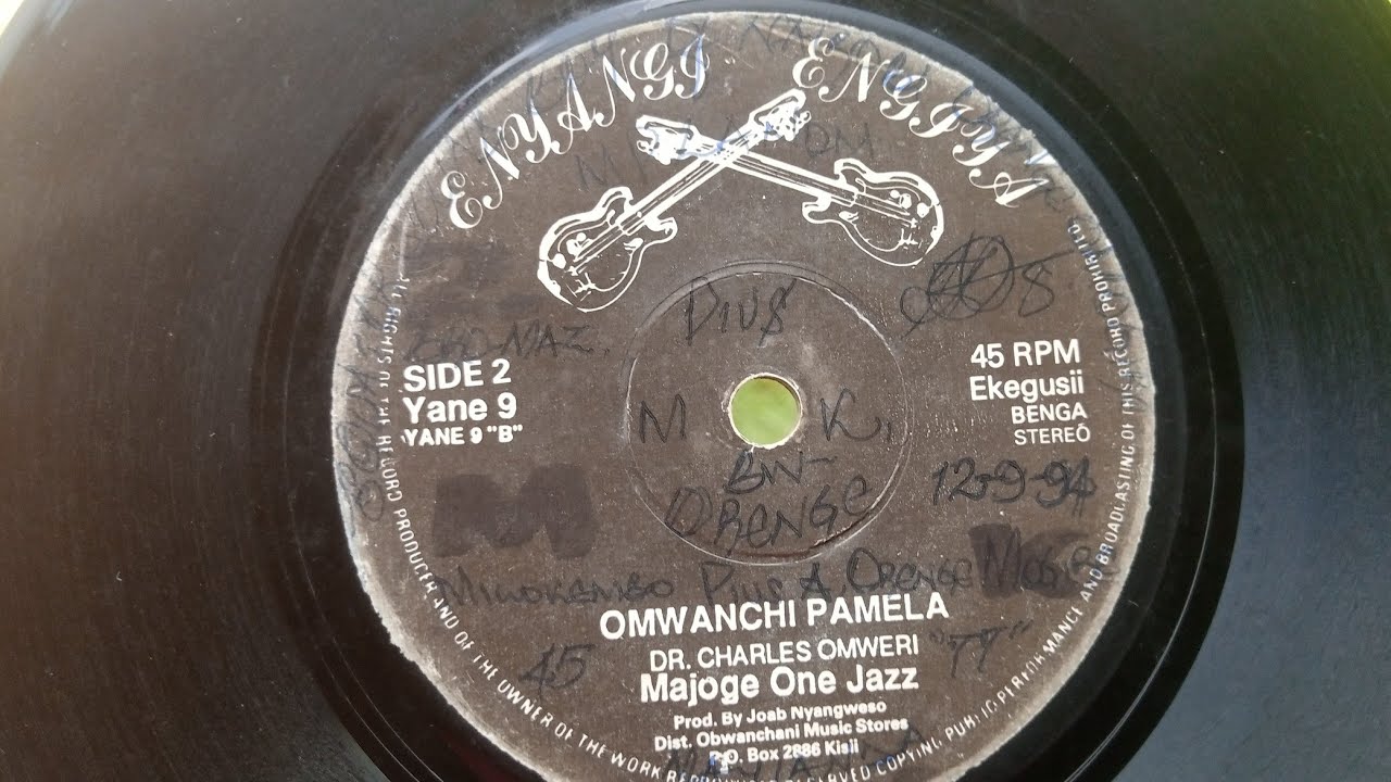 OMWANCHI PAMELLA.BY MAJOGE ONE JAZZ.DR.CHARLES OMWERI.ENYANGI ENGIYA 09 SIDE B