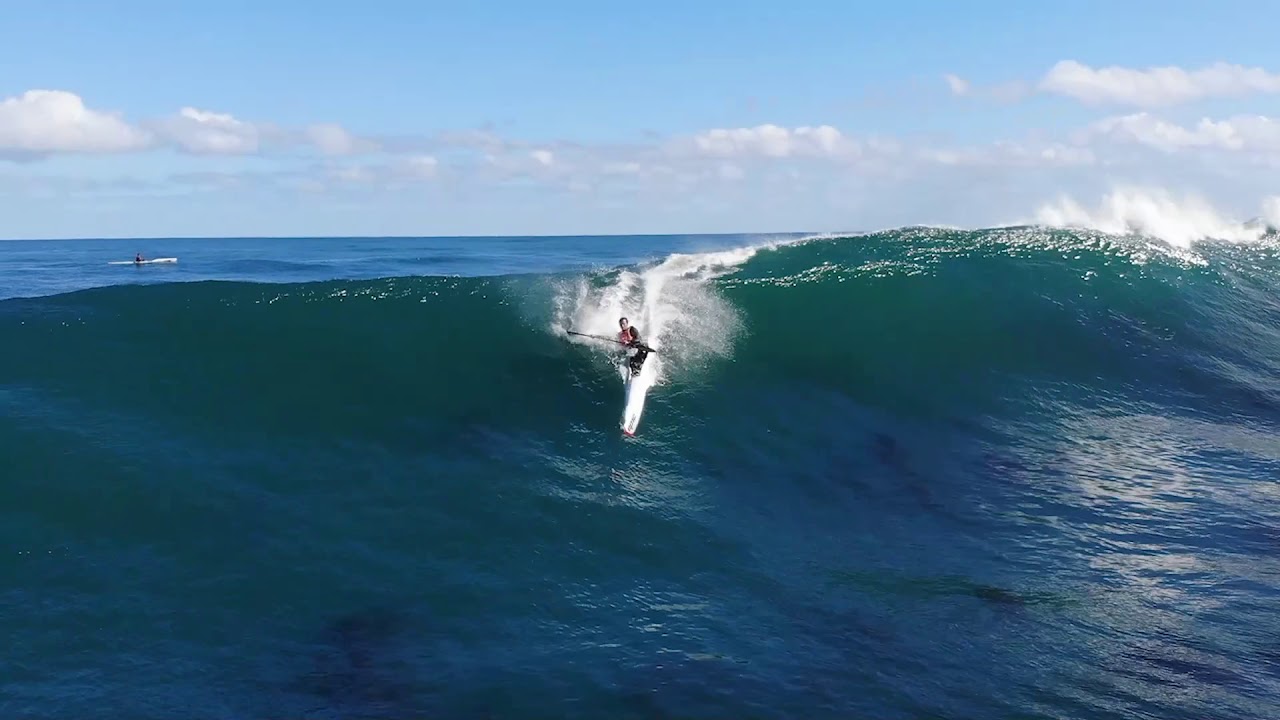 Riding amazing waves on our surfskis to promote our online surfski courses!