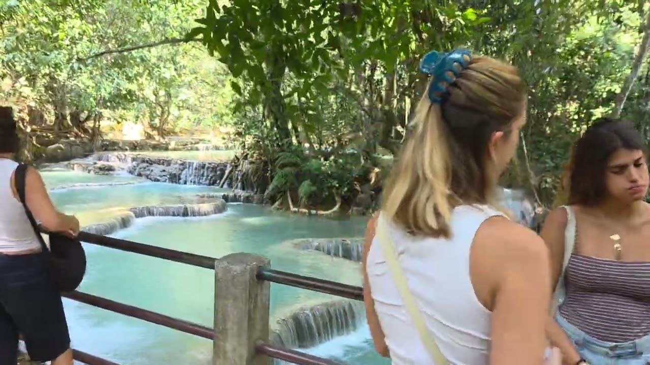 Walk through Kuang S i waterfalls  in Laung Prabang Laos