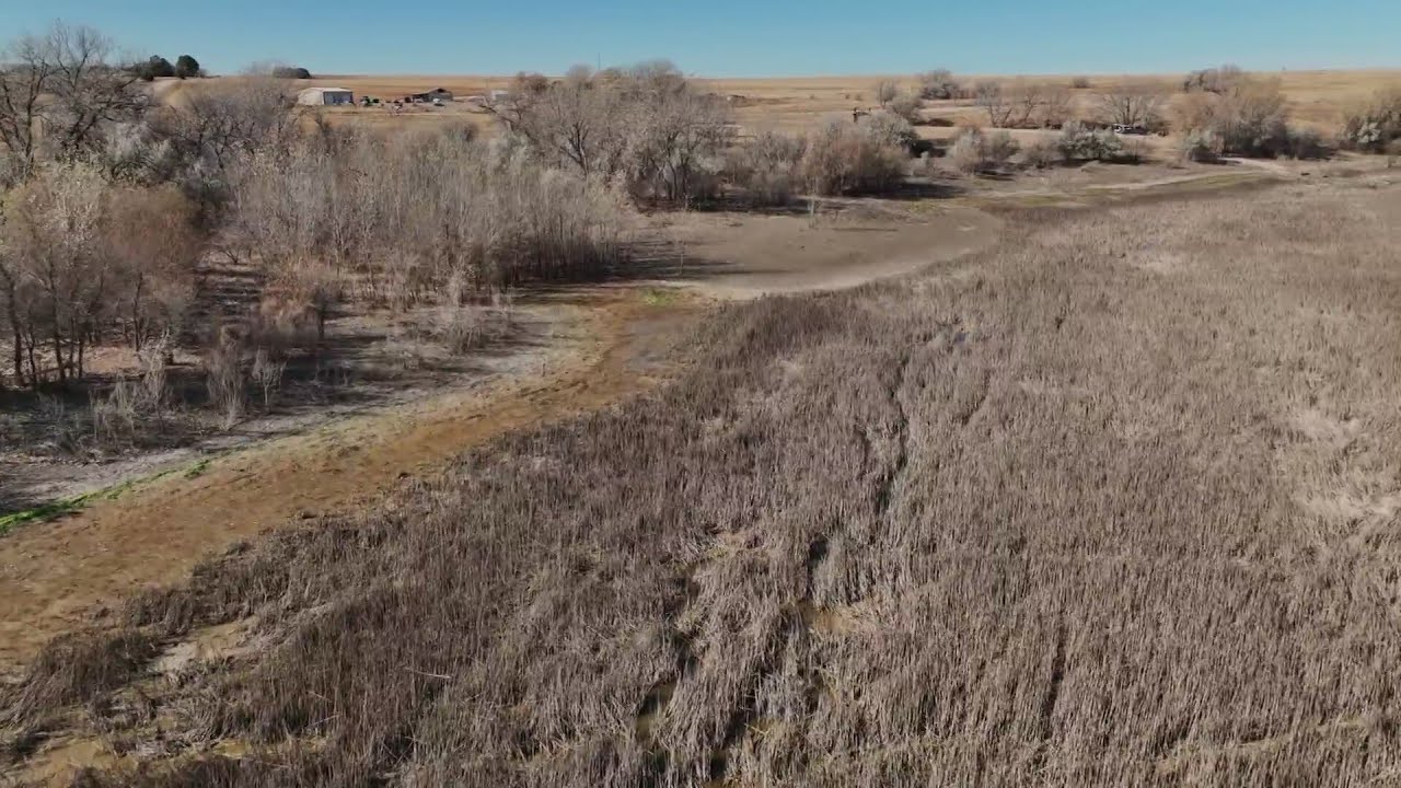 Colorado reservoir empty, farm wells retired amid high demand for water