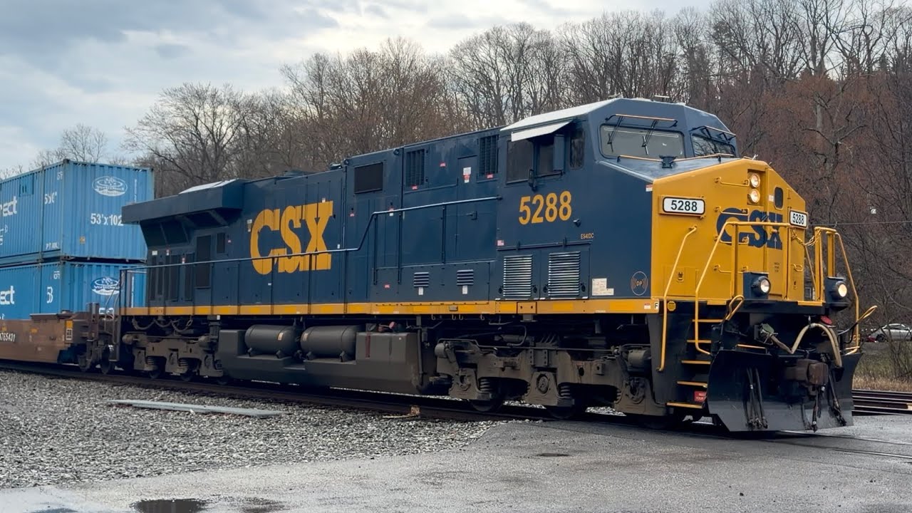 Fresh painted CSX ES40DC leads intermodal train | Cherry Run WV 3/11/2026
