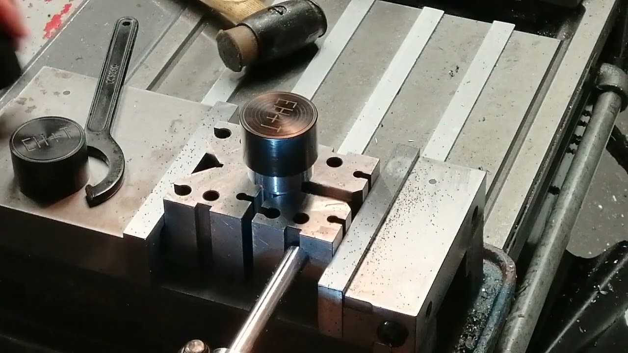 A unique front clamping expansion arbor for increased productivity of parts without a through hole.