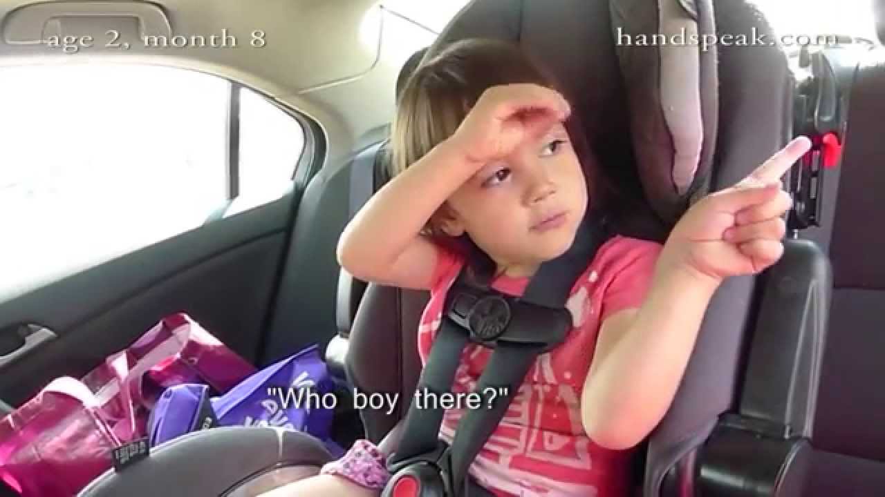Toddler signing American Sign Language (ASL): age 2, month 8