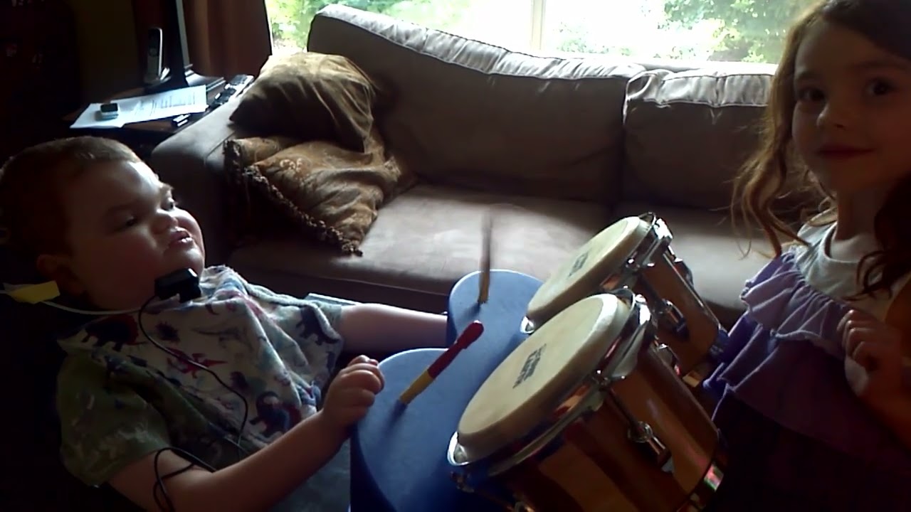 Adapted drum set using a chin switch