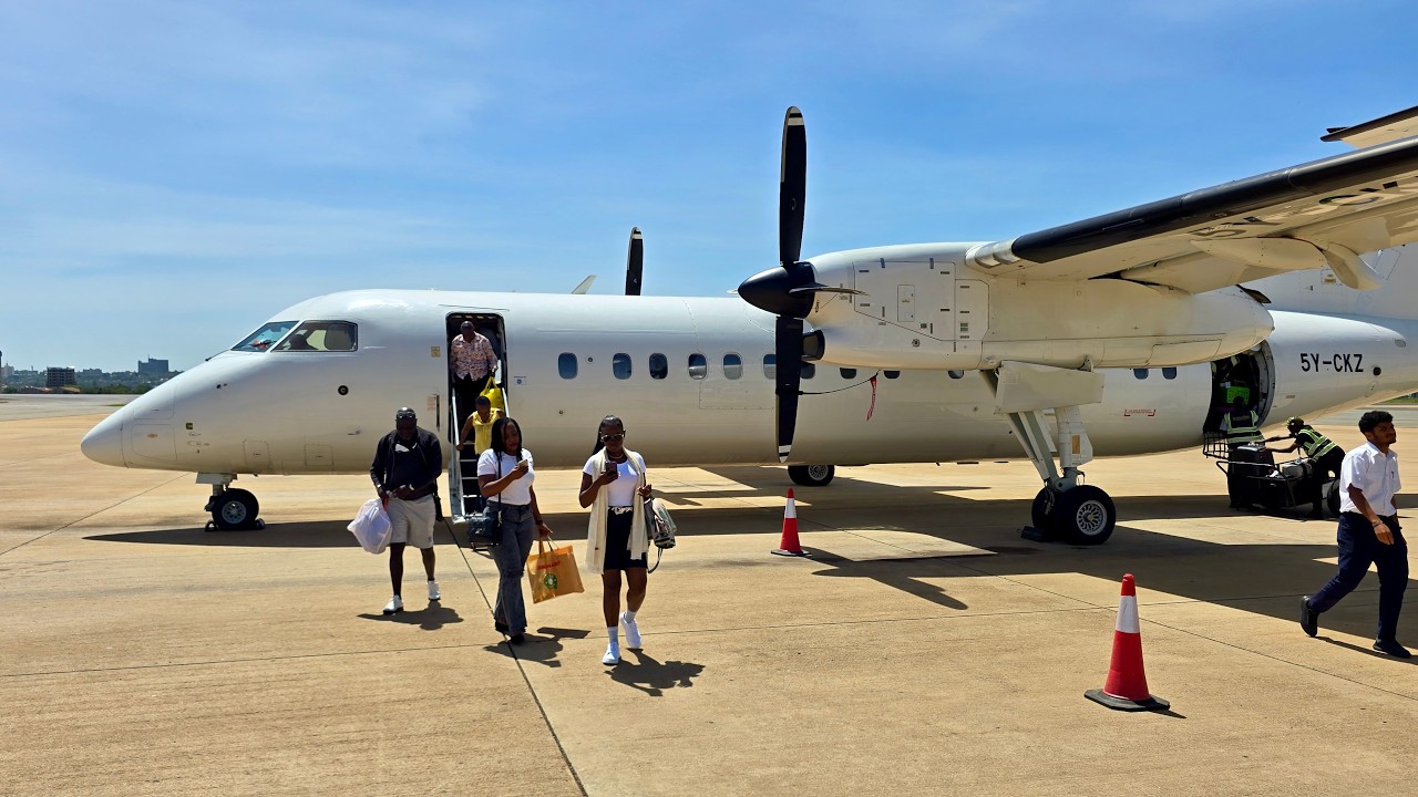 Safarilink Dash 8-300 | Flight from Nairobi Wilson to Kisumu | Lake Victoria, Dunga Beach